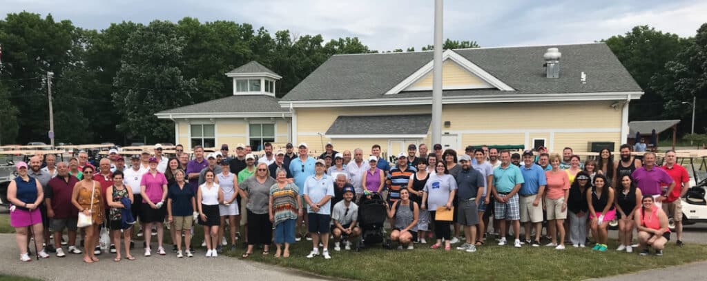 Golfers pose before 2018 event