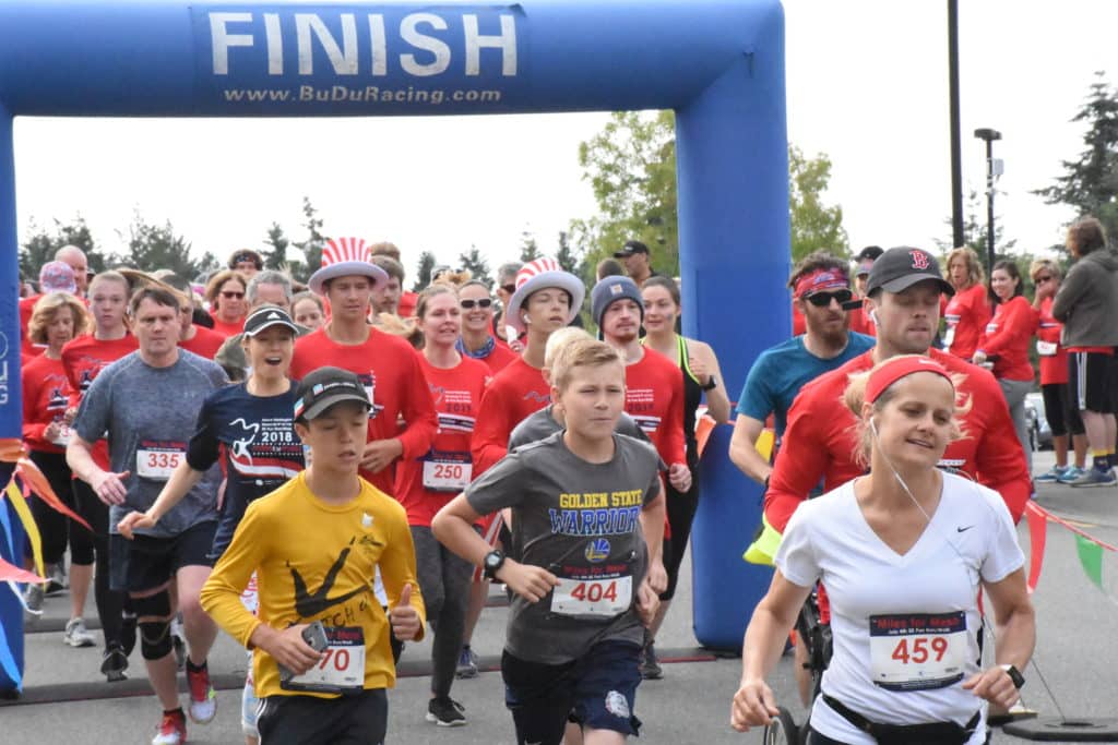 runners on a finish line